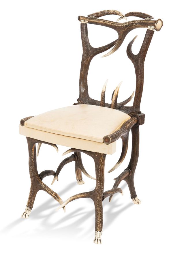 An Antler chair 2nd half 19th century in the manner of Hans Rampendahl 89cm high Provenance: Phillips Chester 2001, sold for £4,400.  Rampendahl...