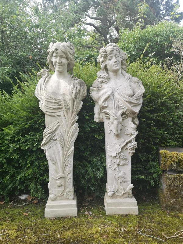 A pair of patinated fibreglass term figures representing Summer and Autumn modern, 145cm high, together with a patinated fibreglass term figure...