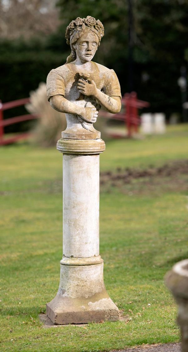 An unusual carved Yorkstone bust of a girl with flowers on pedestal North Country, mid 19th century 194cm high 