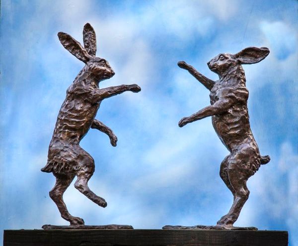 John Cox Boxing Hares Bronze with foundry stamp on a reclaimed oak base 72cm high by 70cm wide, 25cm deep