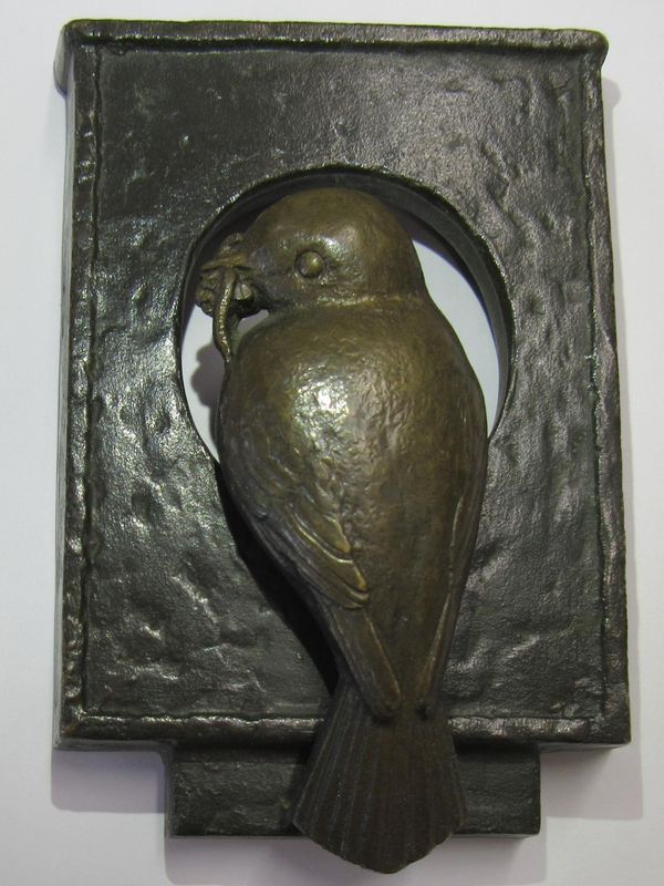 A similar bronze door knocker of a Blue tit with a worm  1930s  unsigned 11cm high by 8cm wide