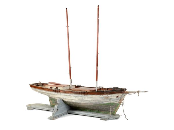 An unusual pond yacht lugger  late 19th century  on later wooden stand 194cm high by 168cm long 