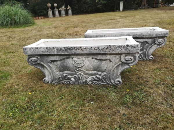 A pair of composition stone troughs modern 39cm high by 97cm wide