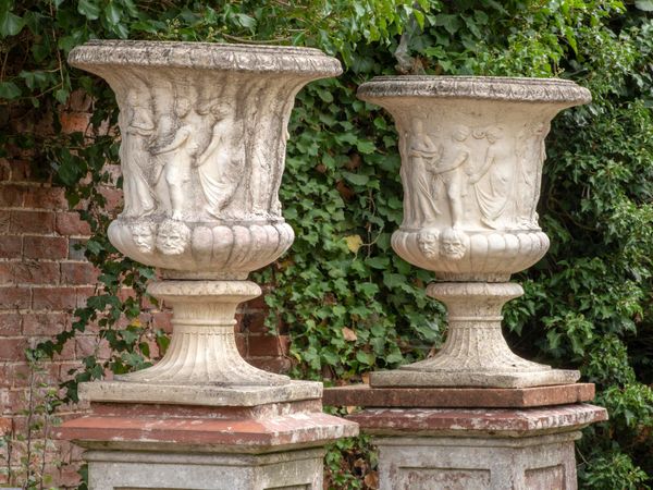 A pair of composition stone Medici urns last quarter 20th centuy  90cm high  