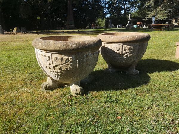 A pair of composition stone circular planters on paw feet 2nd half 20th century 46cm high