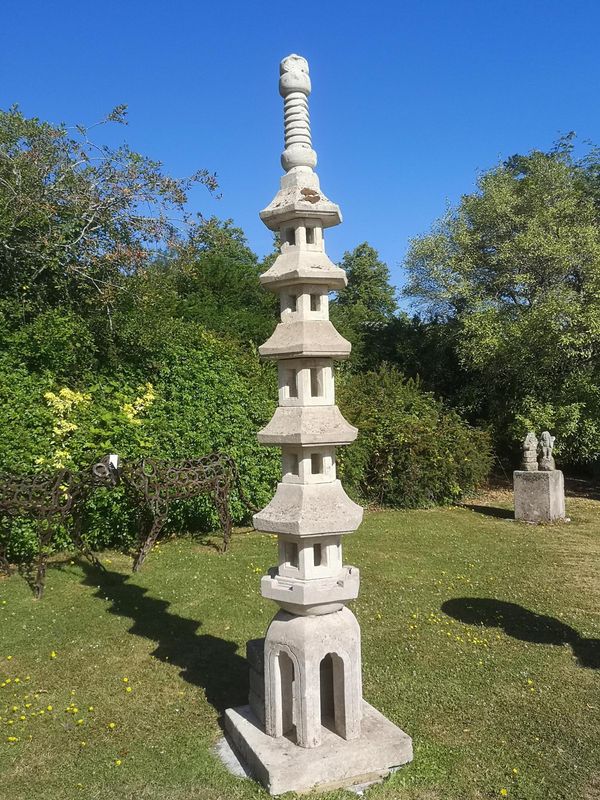 A carved limestone Japanese style multi tier kasuge lantern late 20th century  336cm high