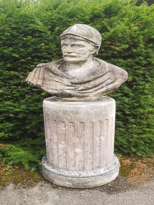 A composition stone bust of a Roman Emperor modern on fluted column pedestal 153cm high