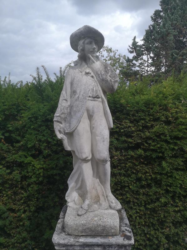 A composition stone figure of a rustic in 18th century dress modern 130cm high