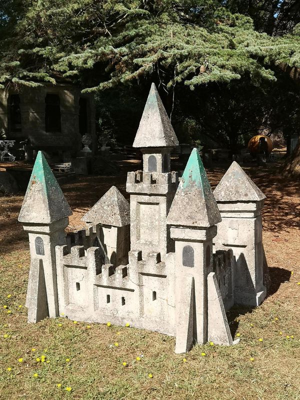 An unusual composition stone castle mid 20th century 134cm high by 120cm wide