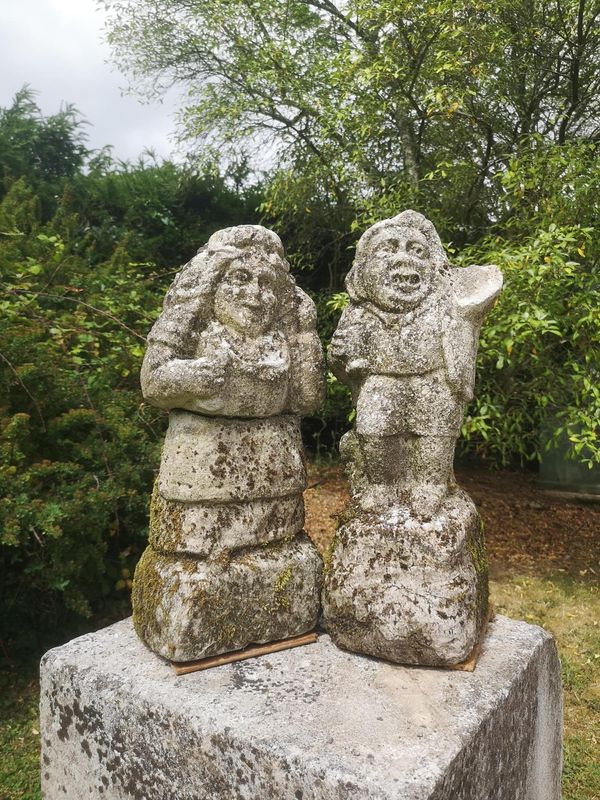 A pair of unusual carved stone dwarfs North Country, 2nd half 19th century 48cm high