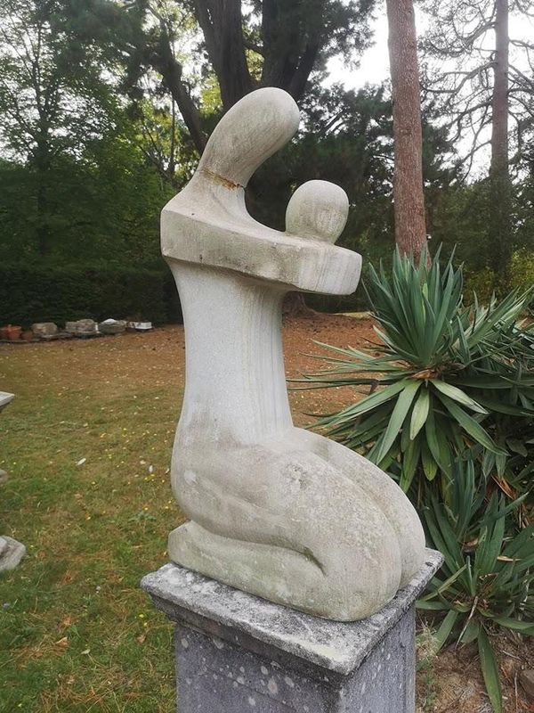 A composition stone kneeling figure 2nd half 20th cenury 100cm high
