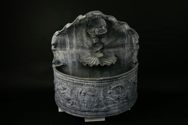 A recycling lead wall fountain of recent manufacture
