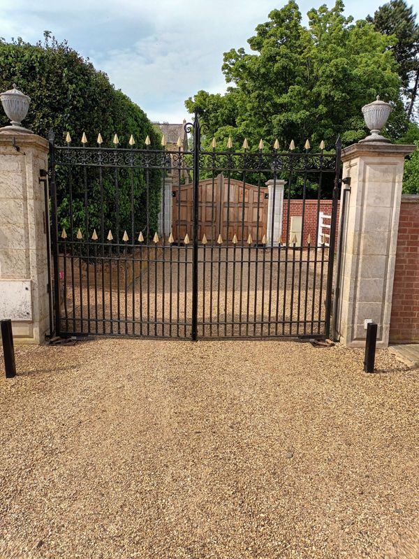 A pair of large wrought iron gates