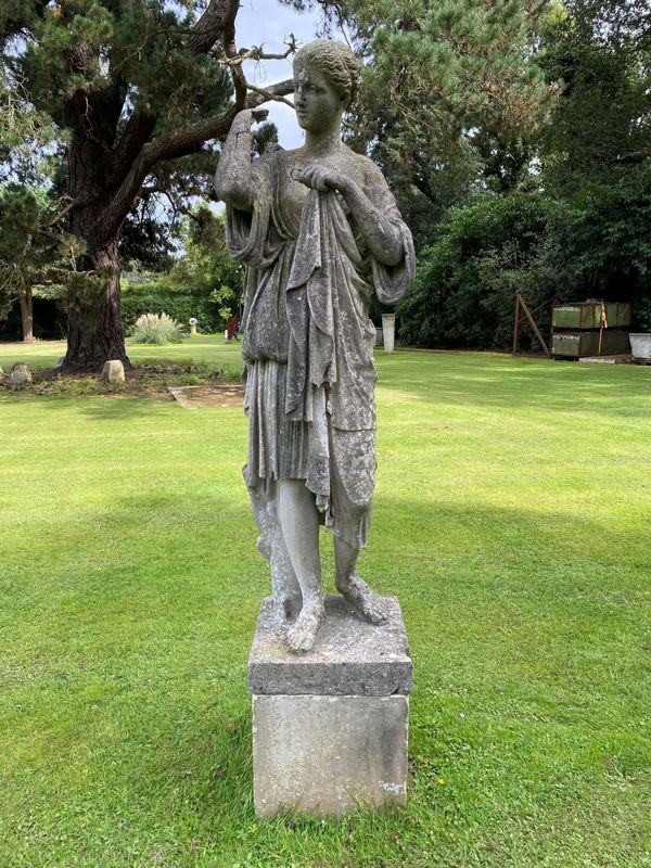 An Austin and Seeley composition stone figure of Diana de Gabies