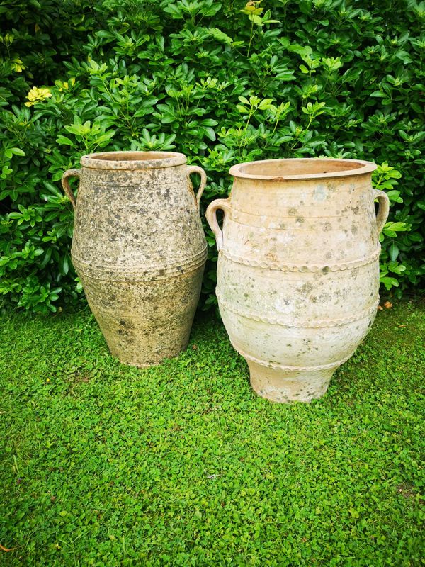 A pair of terracotta storage jars