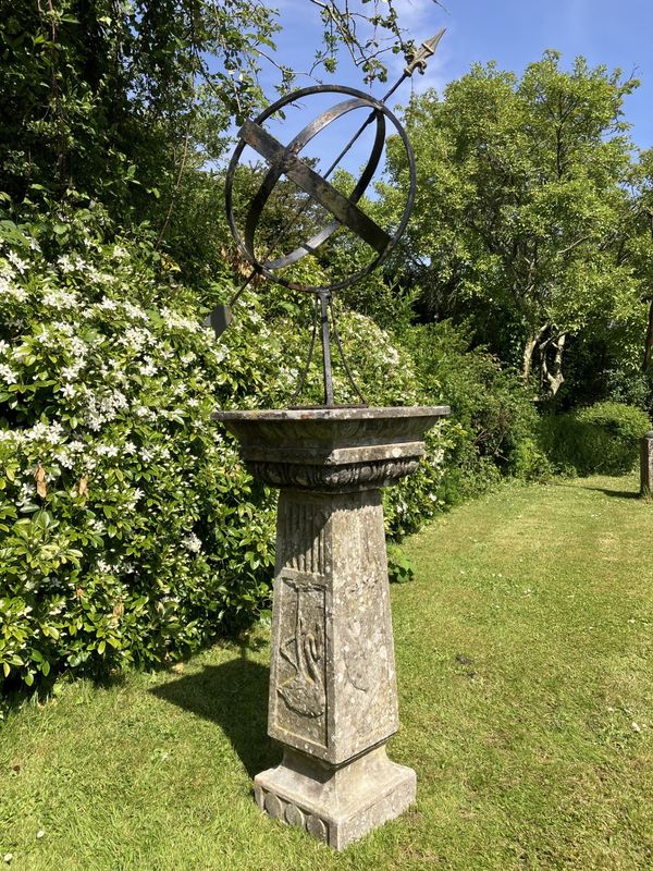 A composition stone armillary sundial