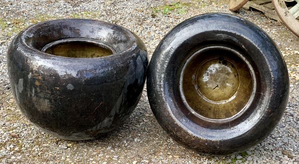 A pair of large planters