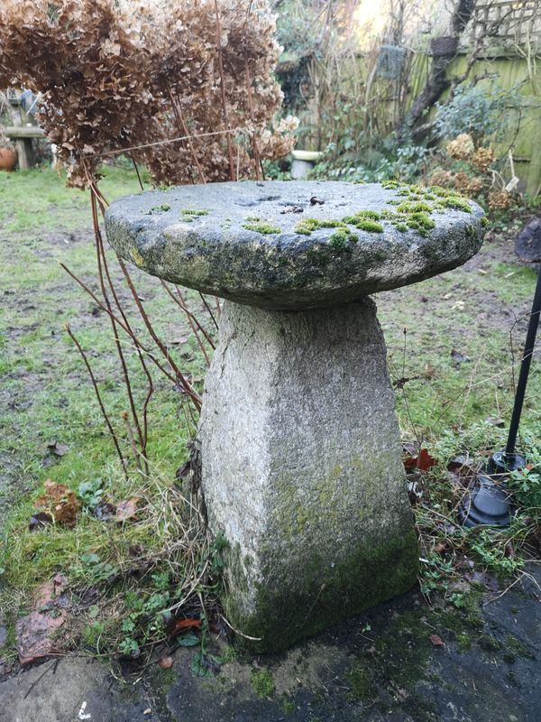 A carved stone staddlestone