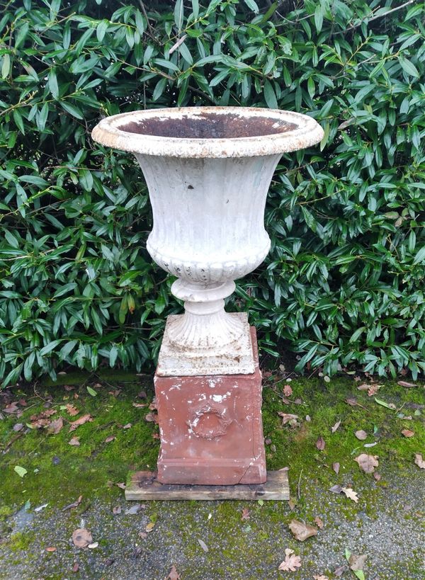 A  Victorian cast iron urn