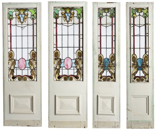 A stained glass entranceway comprising pair doors and two side panels
