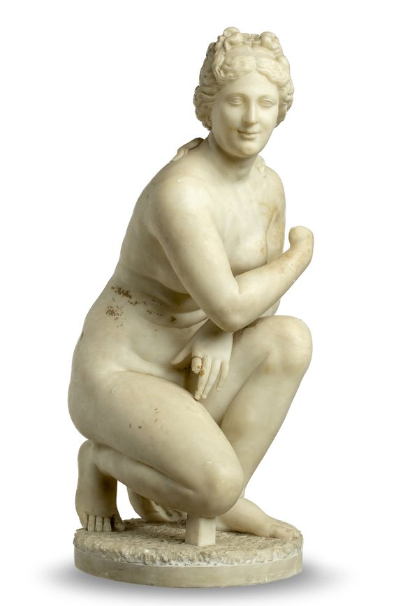 After the antique: A carved alabaster figure of the crouching Venus