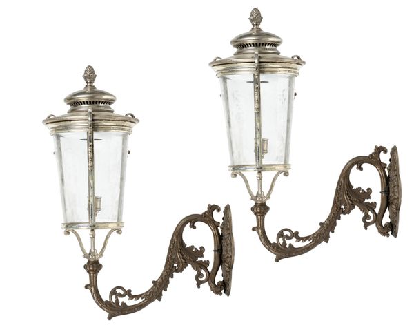 A pair of silvered brass and bronzed iron lanterns