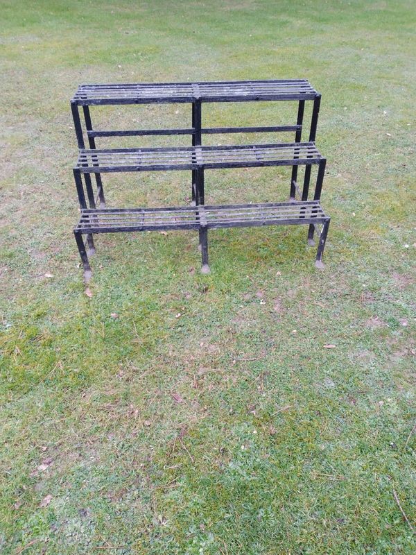 A rare Regency reeded three tier wrought iron plant stand
