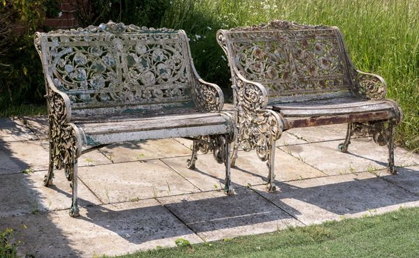 A pair of Coalbrookdale Nasturtium pattern cast iron seats