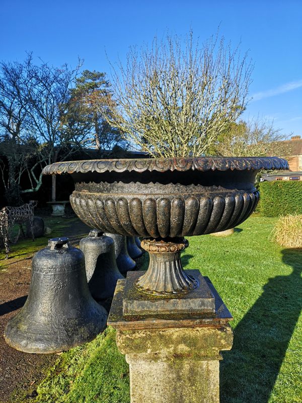 A Victorian cast iron urn
