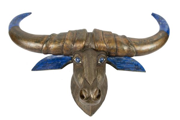 A similar gilded and carved hardwood buffalo head