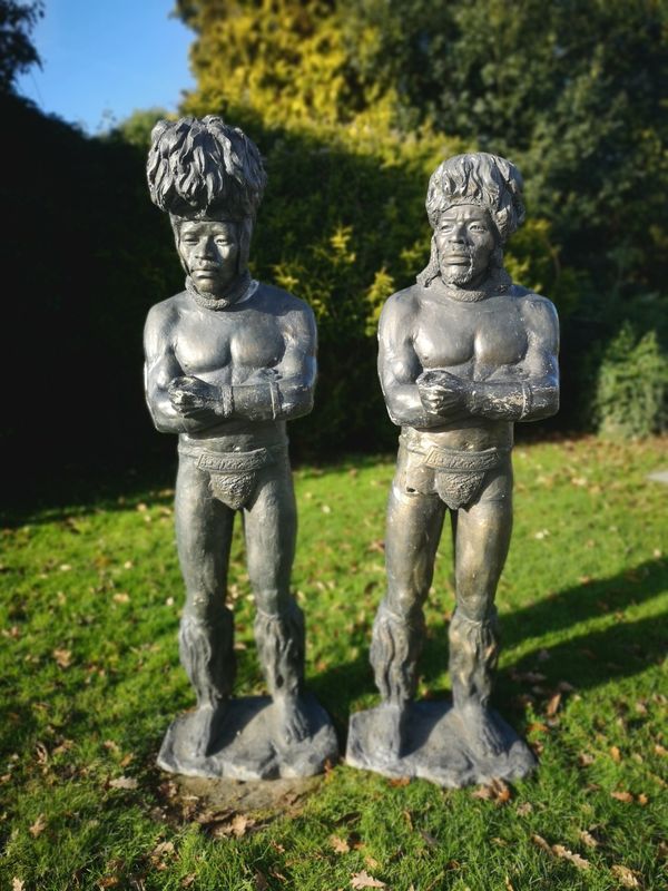 Two patinated fibreglass  figures of Zulu warriors
