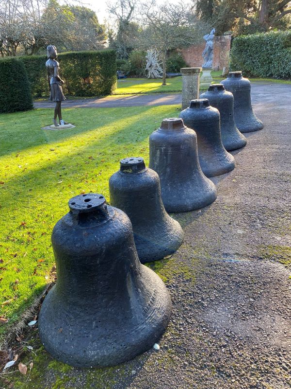 A rare set of six graduated steel bells by Naylor & Vickers of Sheffield