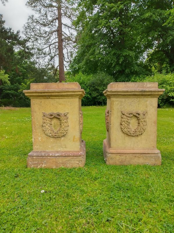 A pair of stoneware plinths