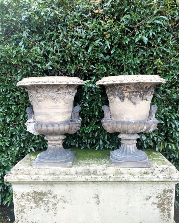 A pair of substantial Doulton stoneware urns