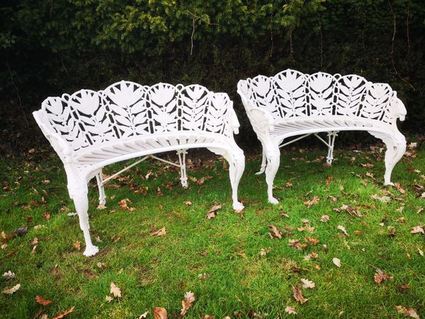 A rare pair of  Coalbrookdale Laurel pattern  cast iron seats