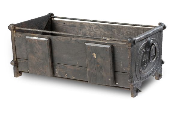 A cast iron log box