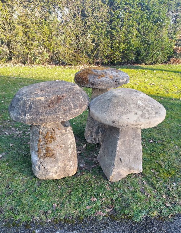 A harlequin set of three substantial cotswold stone staddle stones