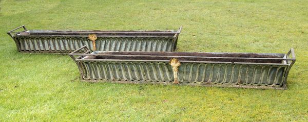 A pair of cast iron window boxes