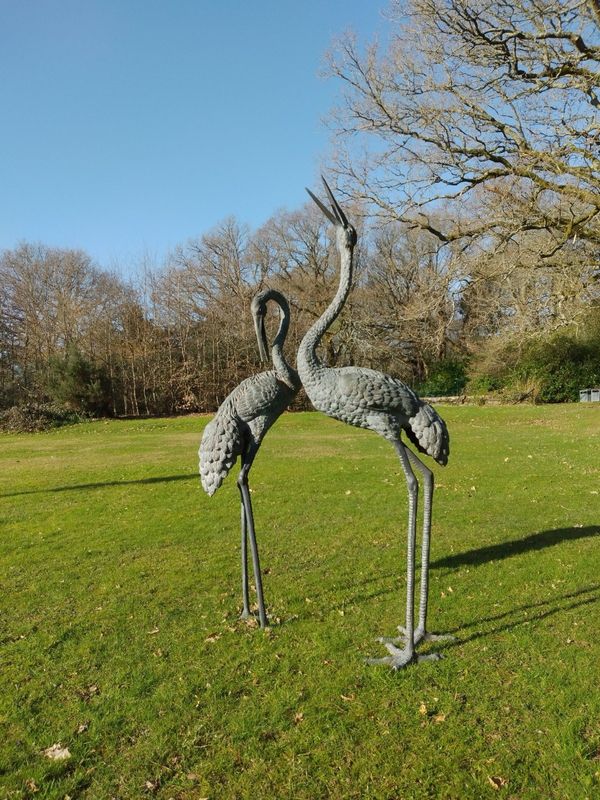 Two bronze cranes