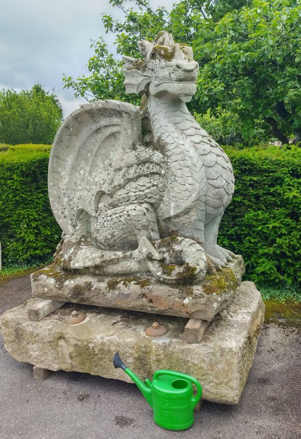 A monumental carved stone stone dragon