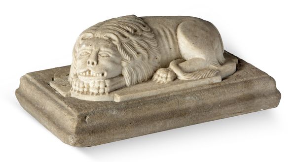 An unusual  carved white marble stylised lion