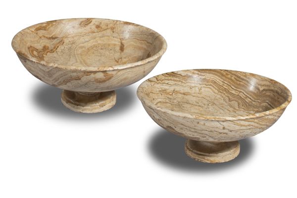 A pair of shallow marble bowls