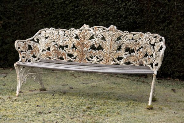 A Coalbrookdale Fern and Blackberry pattern cast iron seat circa 1870 194cm wide (See engraving) 