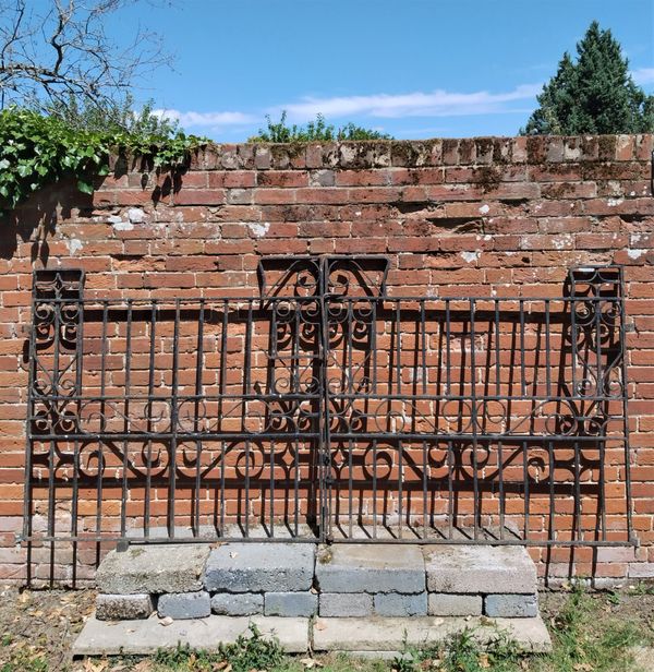 Two pairs of wrought iron gates