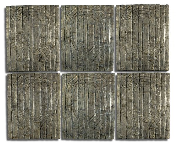 A collection of 34 rectangular bronzed fibre glass faux bamboo wall panels