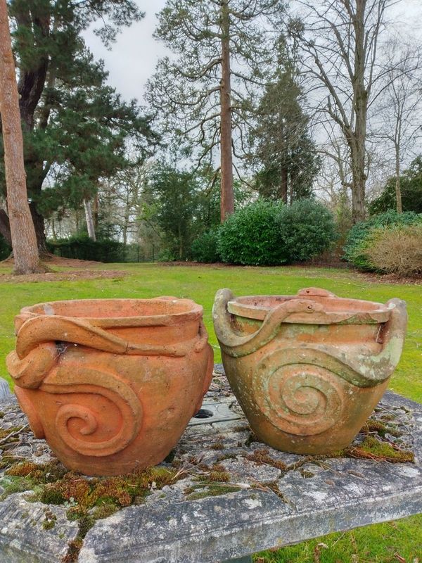 A  Compton pottery snake pot and a Compton pottery eel pot