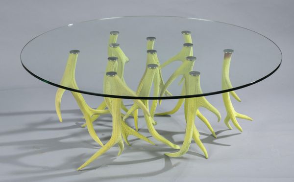 † A similar circular glass mounted natural antler table