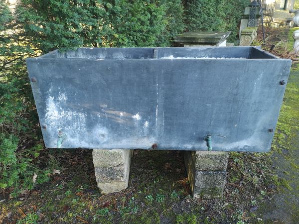A carved slate trough