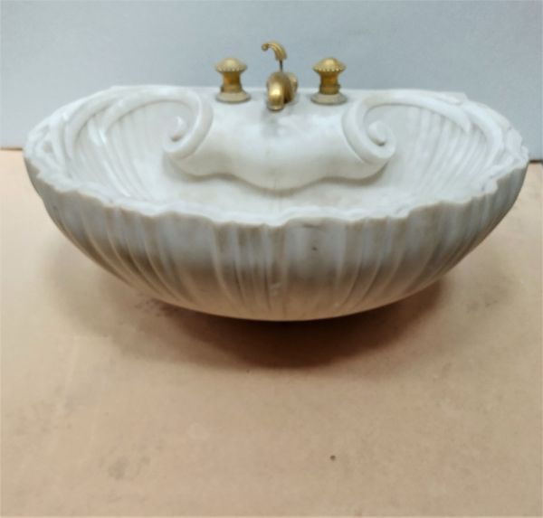 A carved marble basin