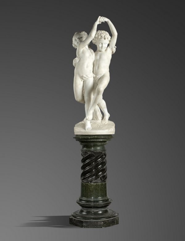 Bastiani Guilio: A carved white marble group of two dancing children